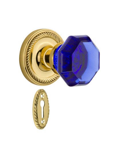Rope Rosette Mortise Lock Set with Colored Waldorf Crystal Glass Knobs Cobalt Blue in Polished Brass.